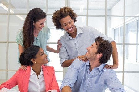 Excellent employees and management congratulating each other IT services Tech Service Today